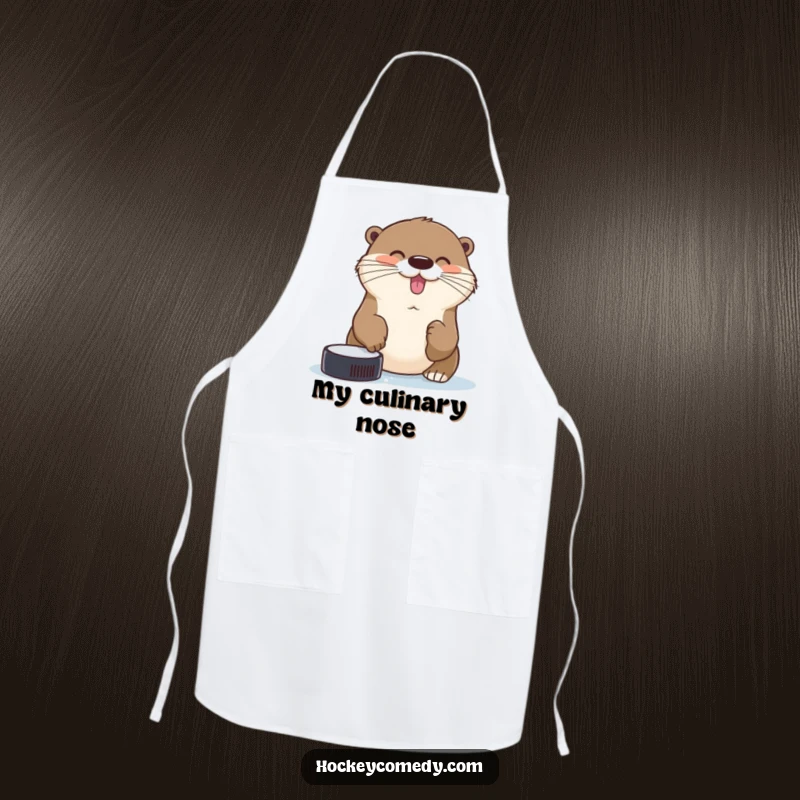 Funny cheerful otter trying to catch a hockey puck with its nose on a humorous kitchen apron.