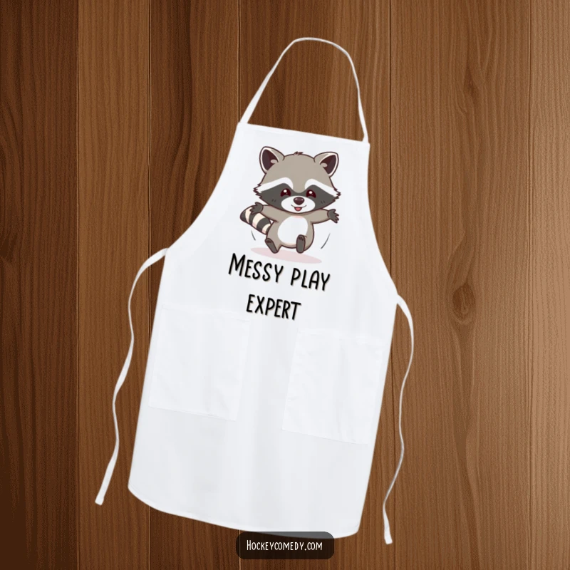 Funny apron displaying a determined raccoon humorously sliding headfirst, ready for kitchen adventures with comical enthusiasm and playful energy.