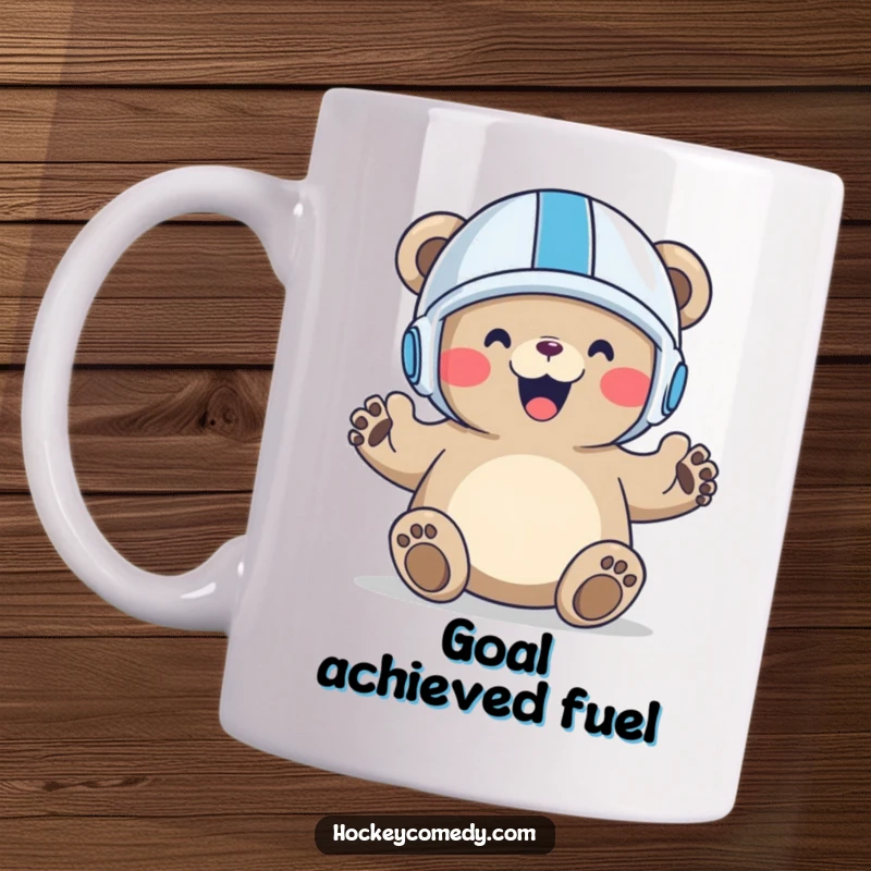 Funny Bear Goal Mug featuring a happy bear in a small helmet celebrating a goal with raised paws, perfect for sports fans.