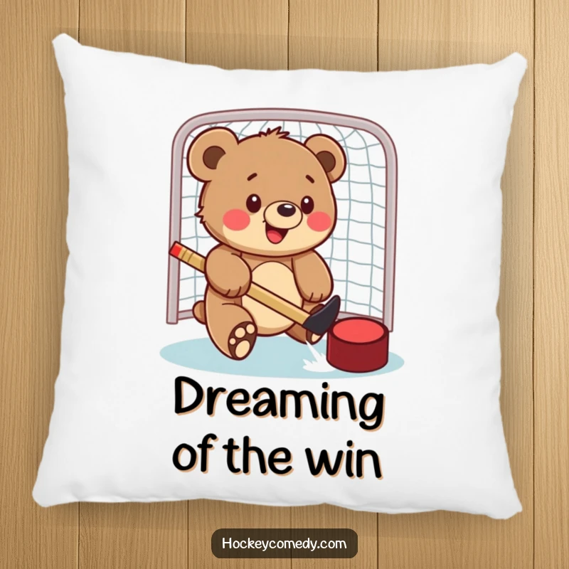 Funny pillow featuring a happy bear cub swatting a hockey puck into a goal, adding a cozy and sporty touch.