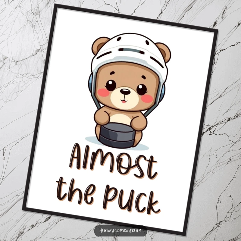 Funny bear in a hockey helmet comically misses a puck on this humorous sports-themed poster.