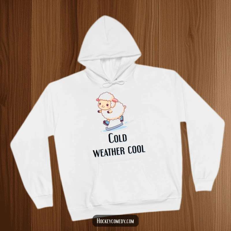 Funny hoodie featuring a fluffy sheep gracefully gliding on ice skates, perfect for anyone who loves winter and humor.