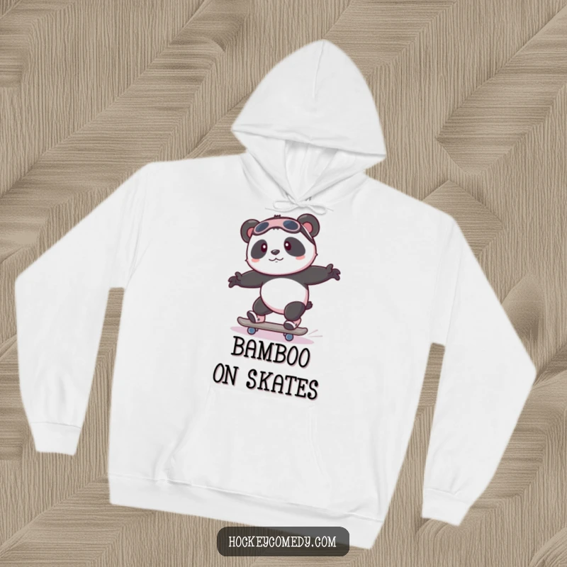 Funny playful panda attempting to skate with wobbly legs on a soft, humorous hoodie.