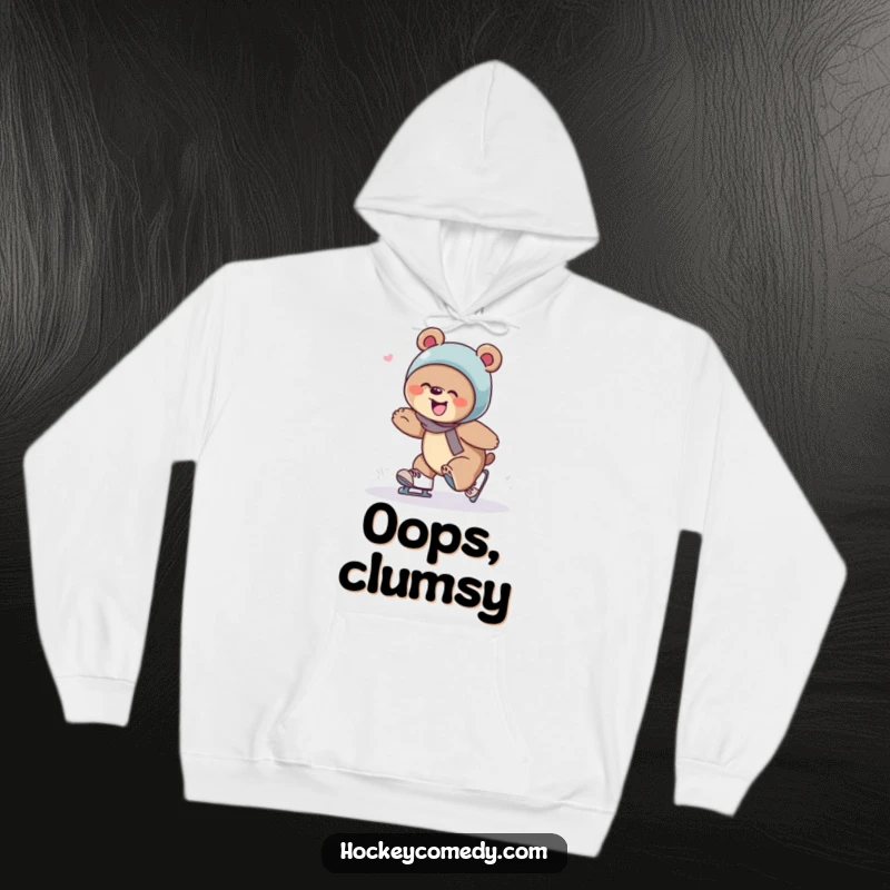 Funny bear in a cozy hoodie, giggling as it trips over its skates, perfect for winter laughs.