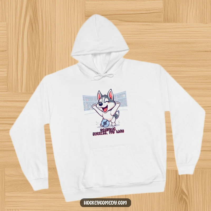 Funny husky hoodie celebrating a soccer goal with a triumphant roar, cozy and warm, a hilarious victory depiction, perfect funny gift.