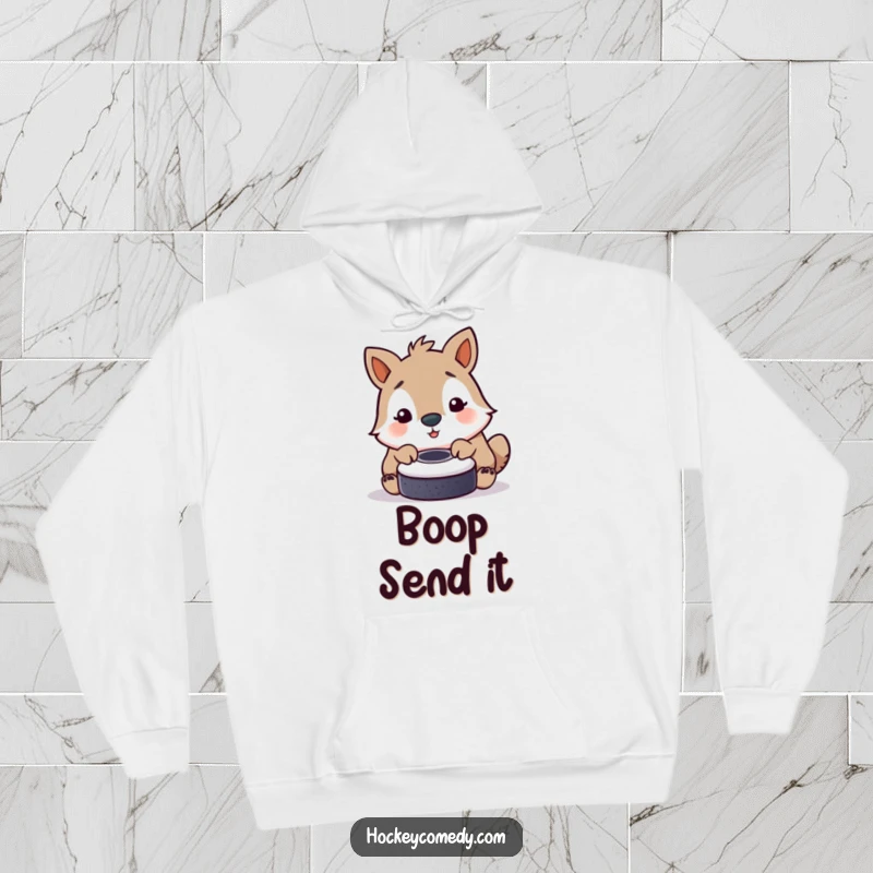 Funny hoodie with a sweet animal using its nose to playfully nudge a hockey puck, embodying gentle fun.
