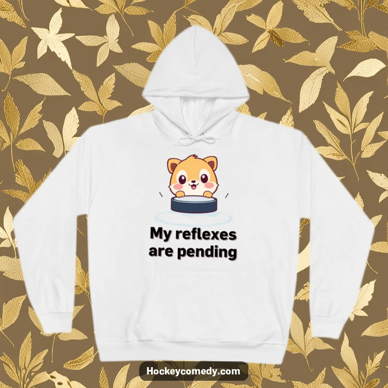 Funny hoodie showcasing a wide-eyed animal comically reacting to a fast-moving hockey puck, perfect for cozy laughs.