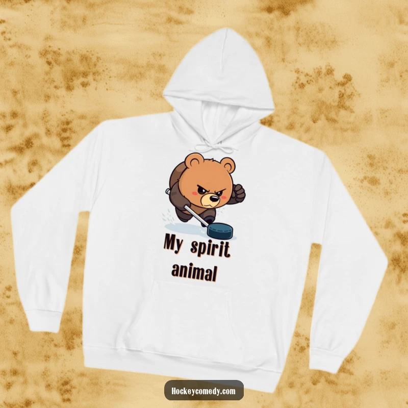 Funny Bear Hoodie: An aggressive bear intensely chasing a hockey puck with a focused, comedic glare. Perfect funny gift.