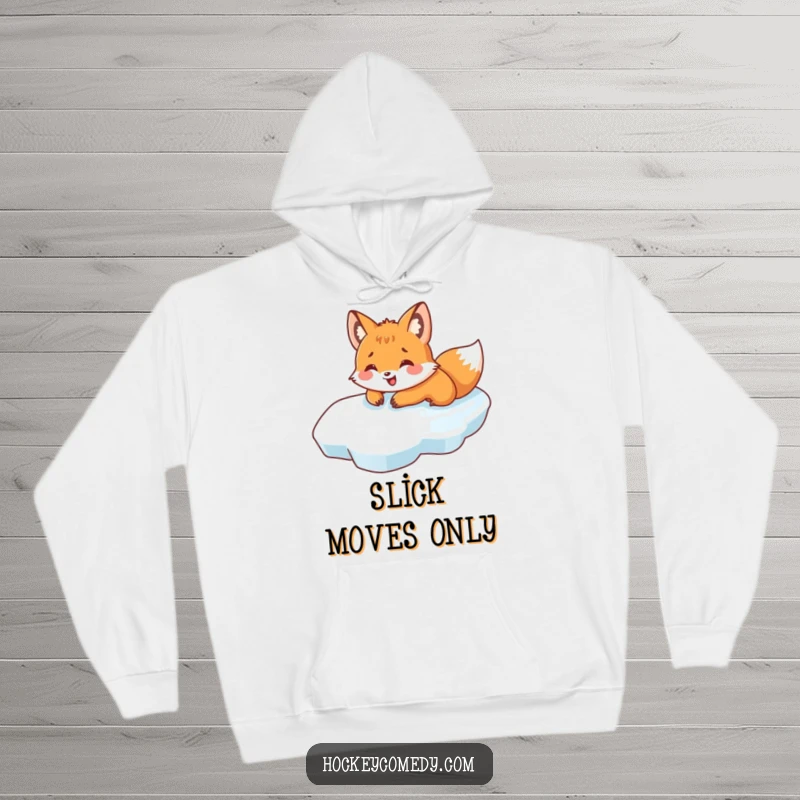 Funny hoodie with a smiling fox sliding on its belly across ice, offering warm comfort and humorous winter vibes.