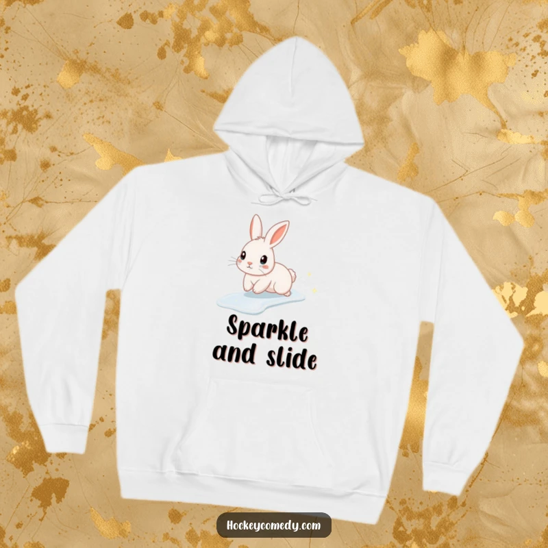 Funny and cozy hoodie with a cute rabbit character ice skating, leaving a trail of enchanting sparkles, ideal for winter warmth.