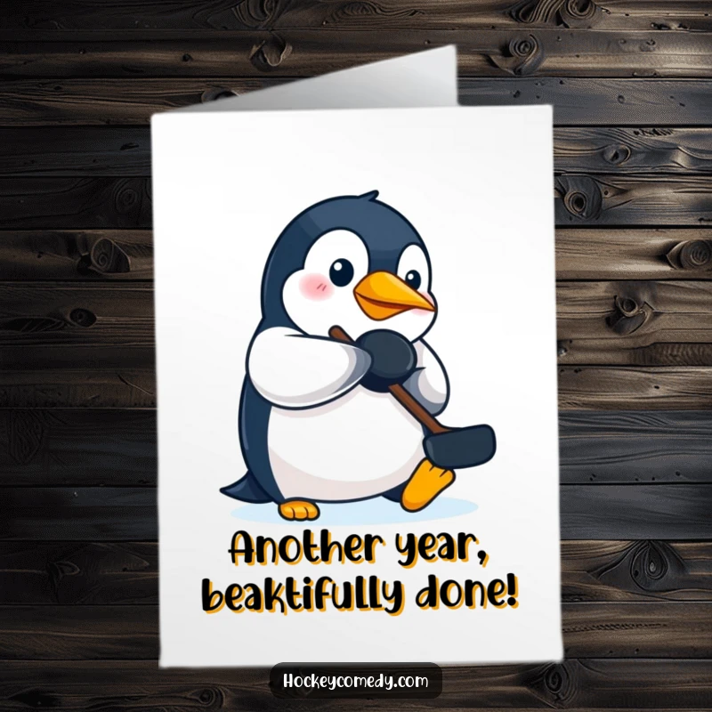 Funny Free Printable determined penguin heroically batting a hockey puck with its beak on a birthday card.