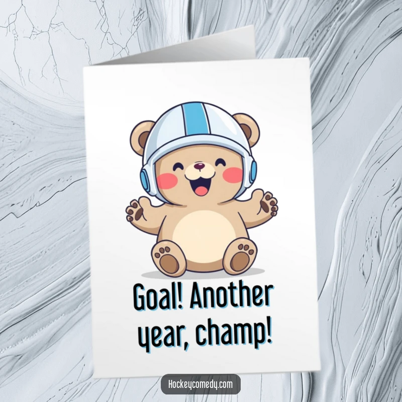 Funny free printable birthday card: A bear in a tiny helmet joyfully celebrates scoring a goal with paws raised in victory.