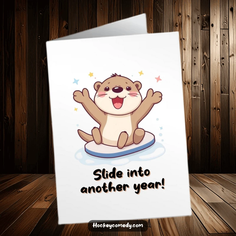 Funny Free Printable Birthday Card: Happy otter character doing a celebratory slide on the ice with a huge smile.