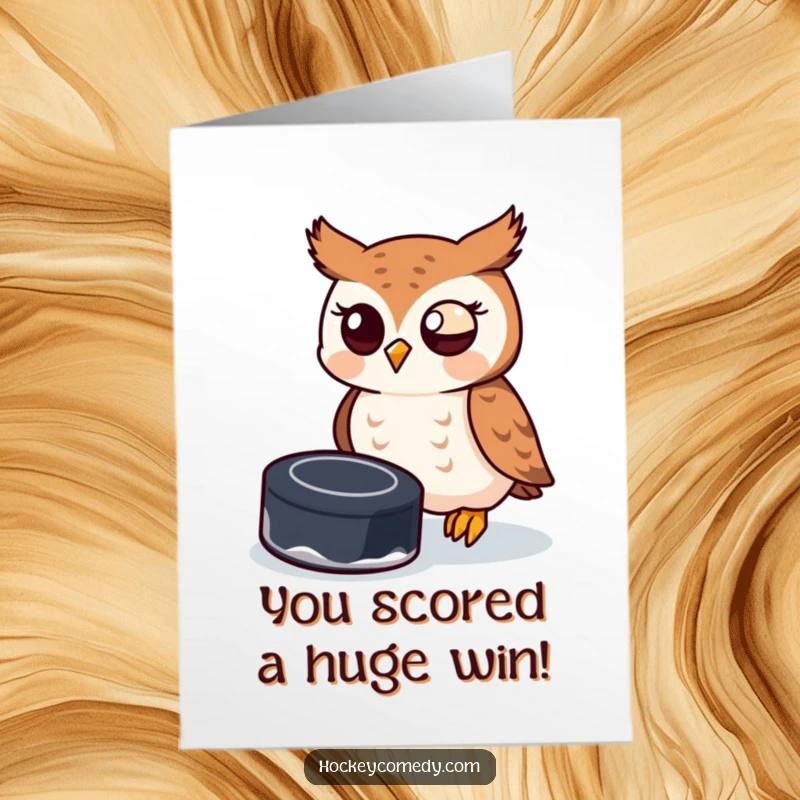 Funny Free Printable Congratulations Card showing a playful owl trying to block a hockey puck with its beak, celebrating a win.