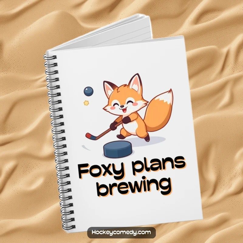 Funny notebook featuring a cheerful fox attempting a slap shot, puck slightly off target, perfect for capturing notes with humor.