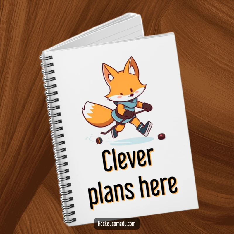 Funny notebook featuring a determined fox skating with a puck, leaving a zigzag trail, ready for notes.