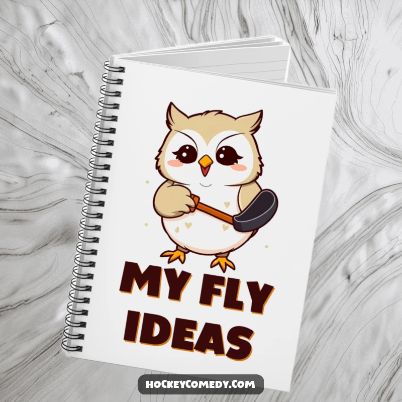 Funny Notebook cover with a giggling owl comically trying to catch a hockey puck, designed to inspire and amuse.