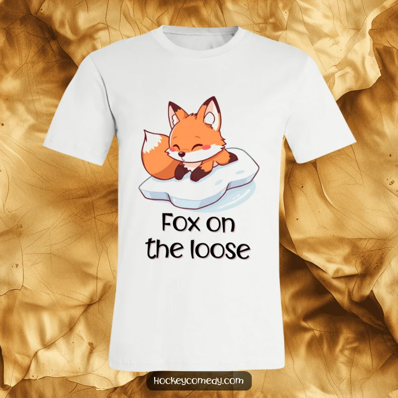 Funny determined fox sliding on its belly across ice, featured on a humorous and adventurous t-shirt.