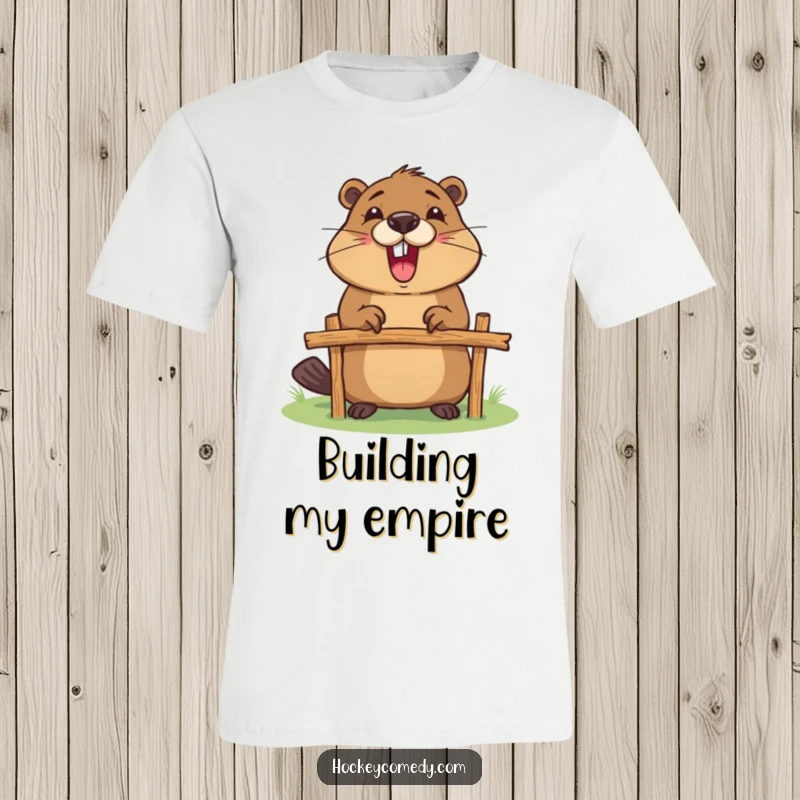 Funny t-shirt illustrating an excited beaver focused on building a small goalpost out of twigs and branches.