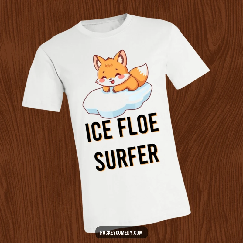 Funny t-shirt featuring a delighted fox sliding on its belly across ice, capturing the exhilaration of winter play.