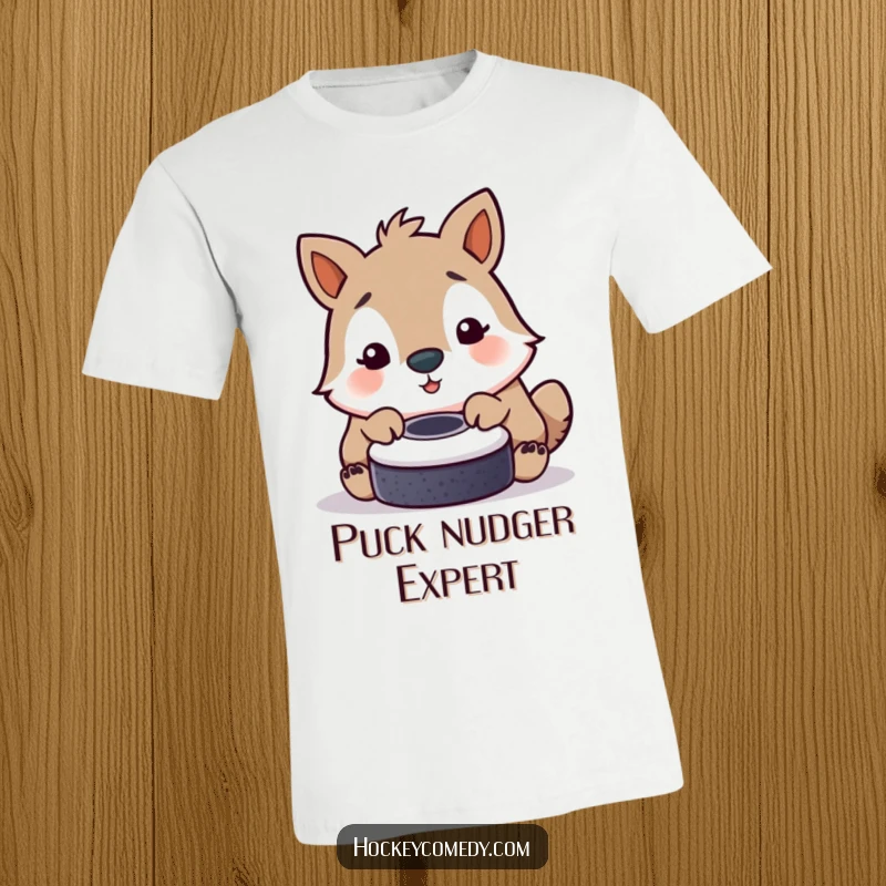 Funny t-shirt illustrating an animal playfully tapping a hockey puck with its nose, conveying sweet, gentle interaction.