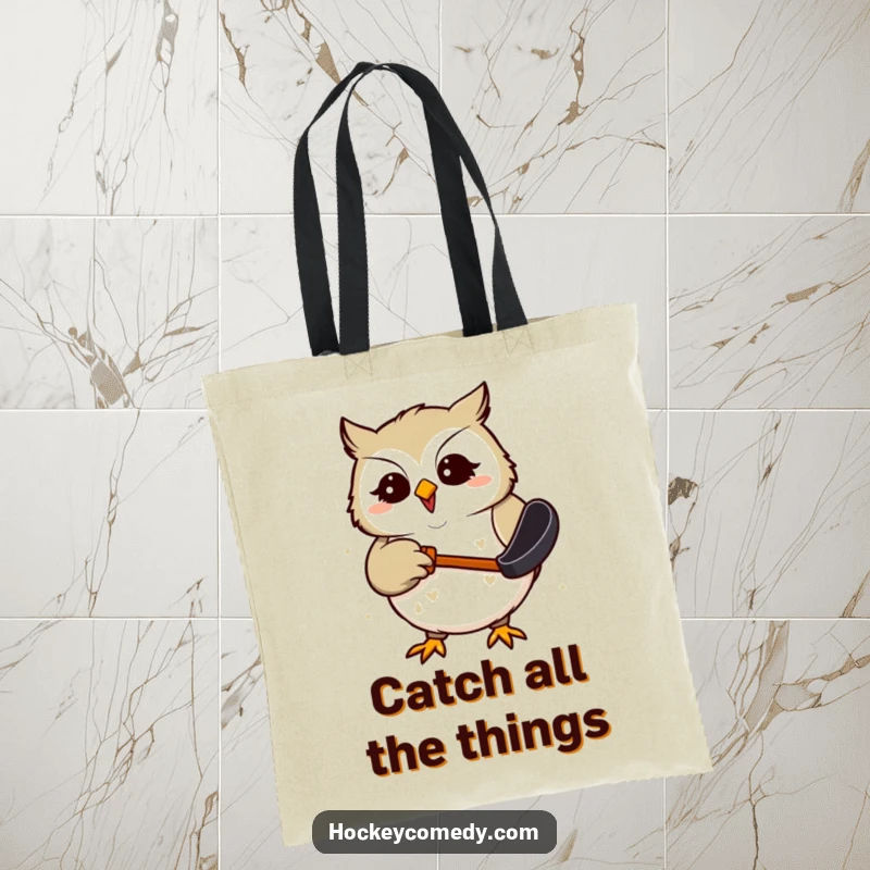 Funny Tote Bag showing a giggling owl intently trying to catch a hockey puck, ideal for carrying essentials with a humorous touch.