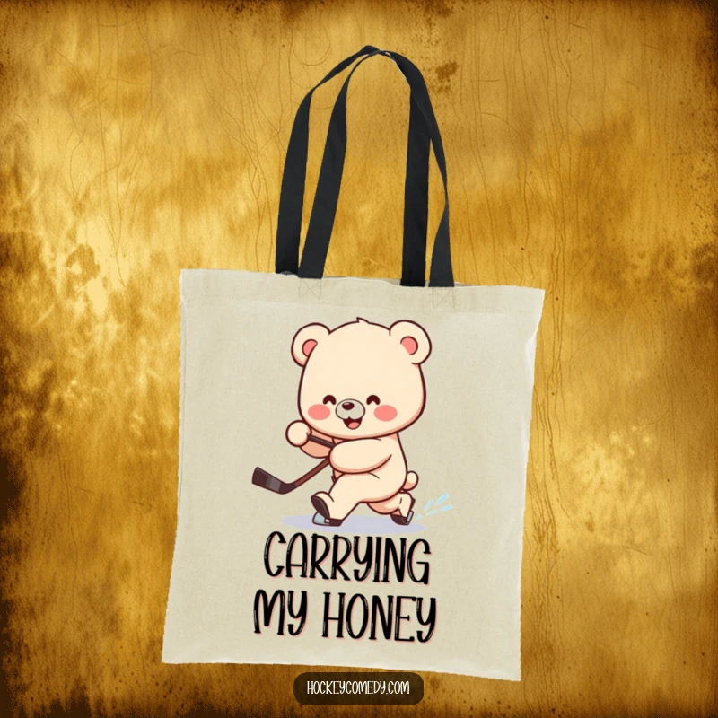Funny tote bag featuring a smiling bear attempting a clumsy hockey deke, stick trailing behind, full of joy.