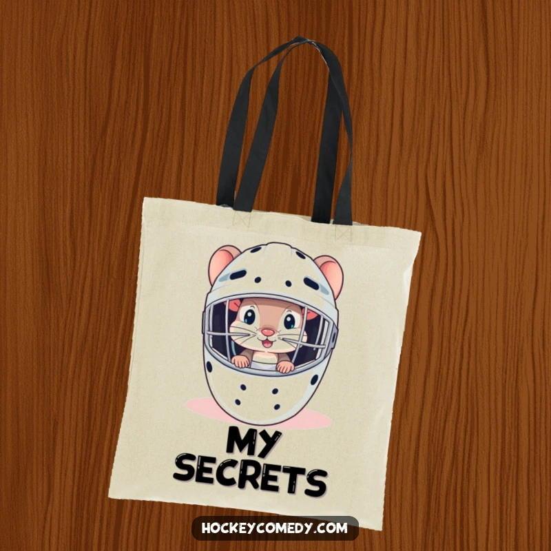 A curious mouse peeking from a goalie mask, printed on a durable and funny hockey tote bag.
