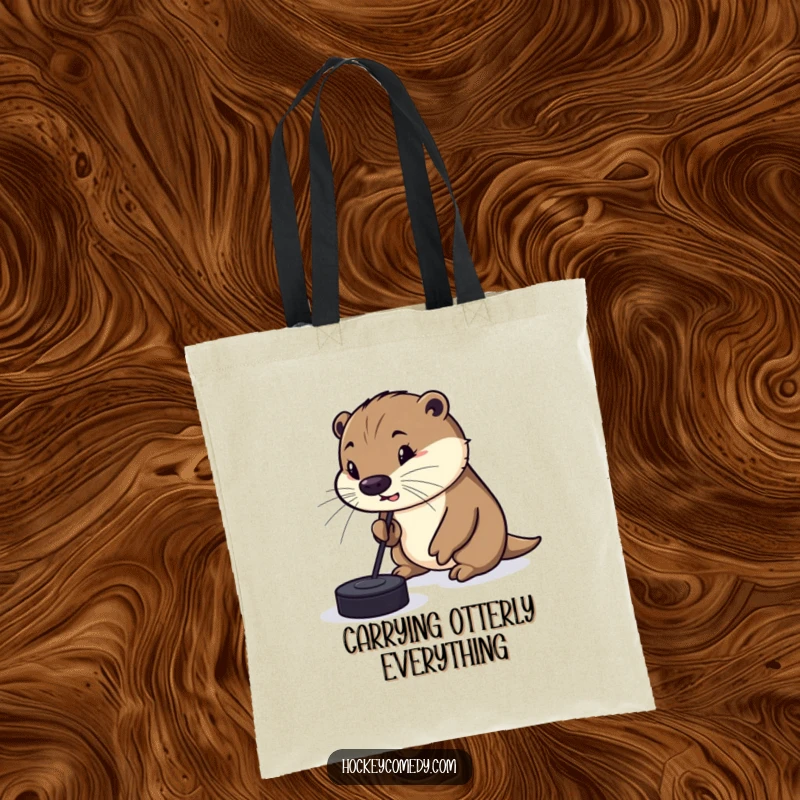 Funny Tote Bag showing a silly otter comically attempting to dribble a hockey puck with its nose, perfect for carrying essentials with a humorous touch.