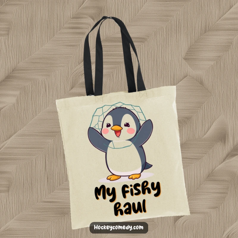 Funny tote bag featuring a delighted penguin flapping enthusiastically while guarding a hockey net, full of energy.