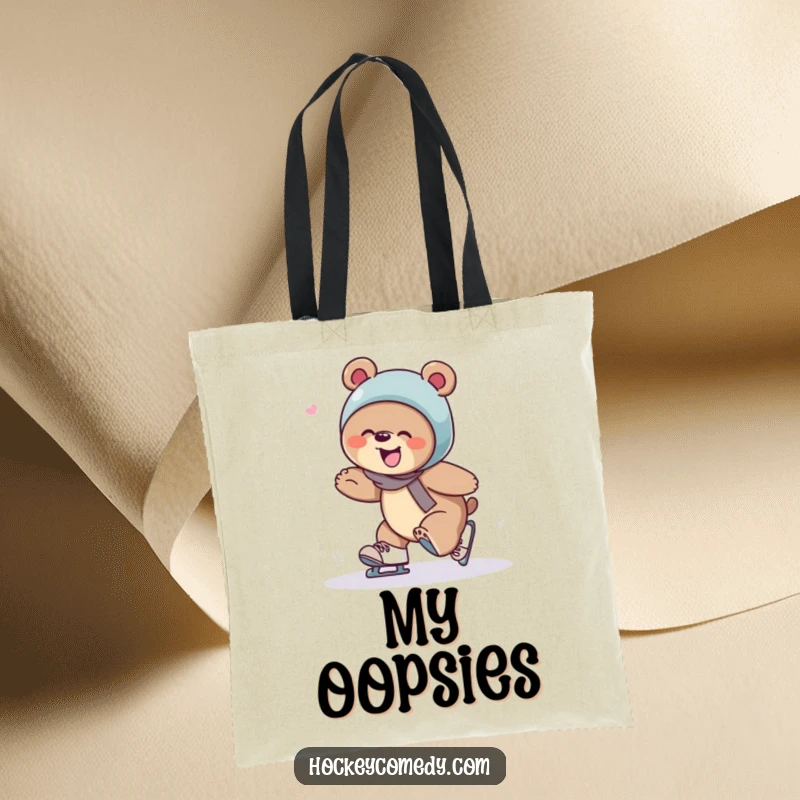 A giggling bear tripping comically over skates, printed on a durable and funny tote bag.